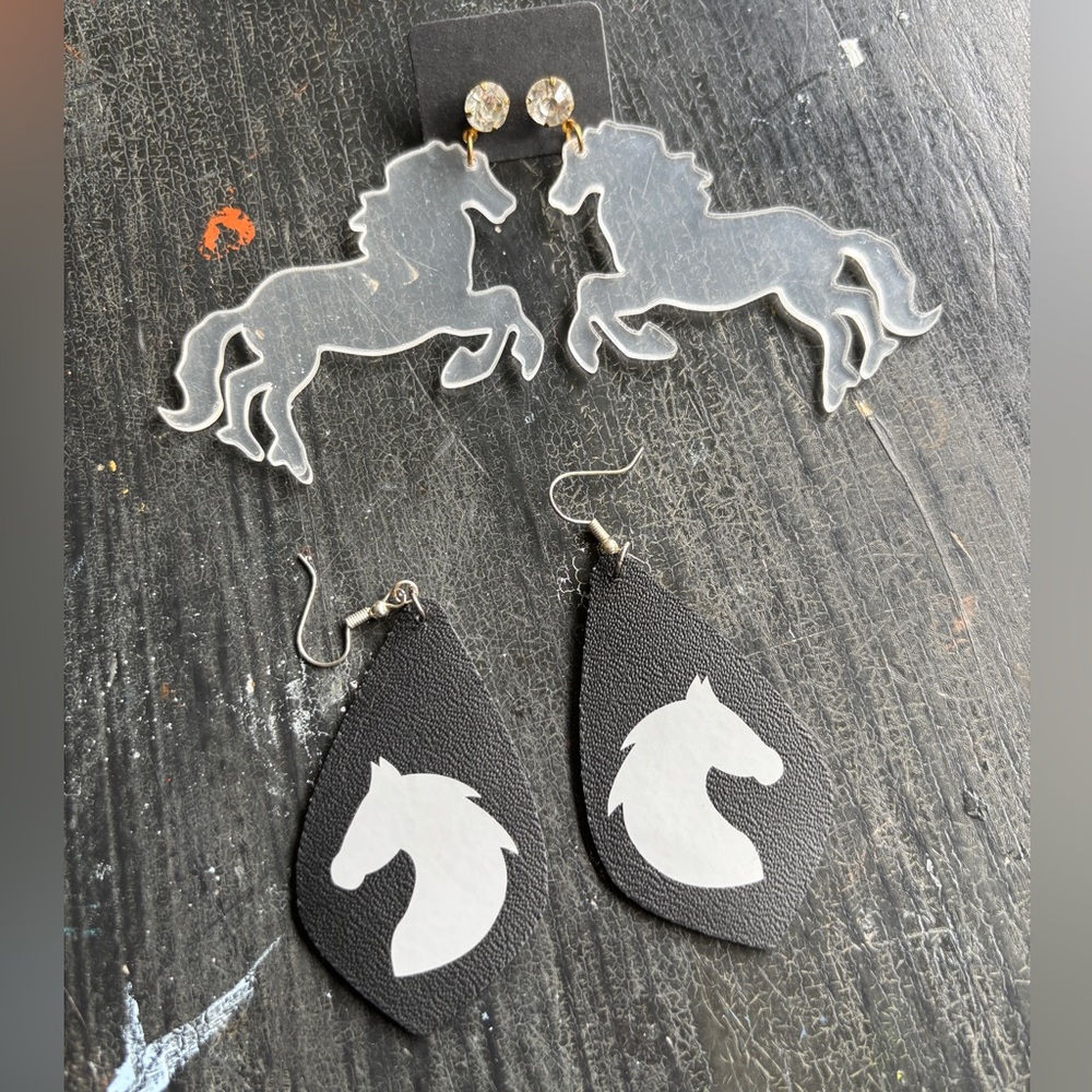 two pair of horse earrings